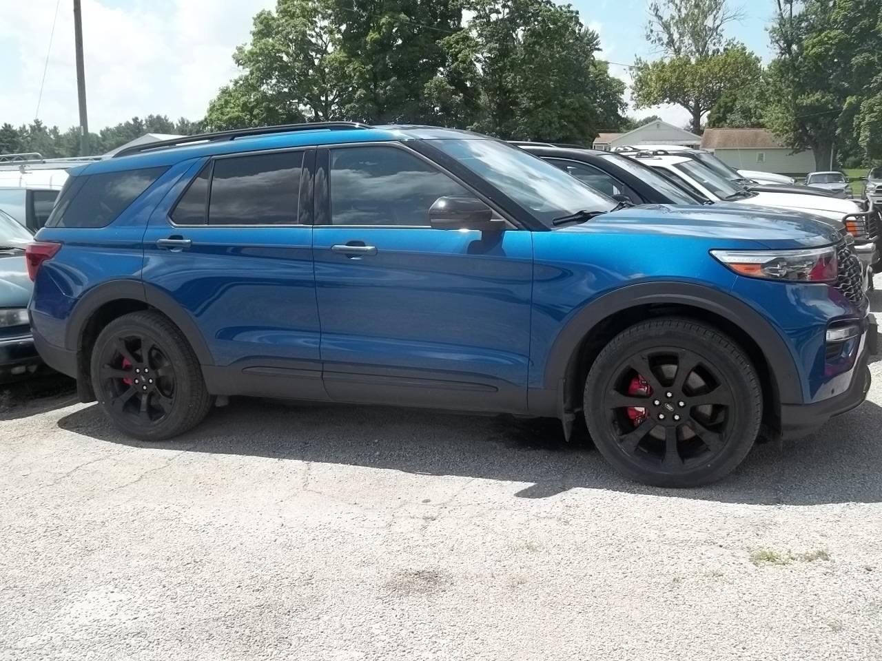 2020 Ford Explorer ST in Atlas Blue Metallic — front three-quarter view