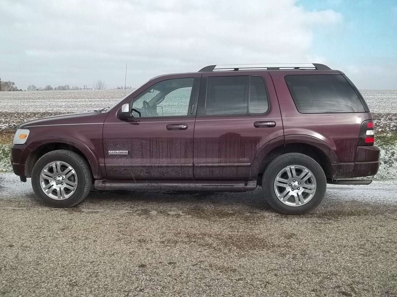 2006 Ford Explorer Limited in Dark Cherry Metallic — front three-quarter view