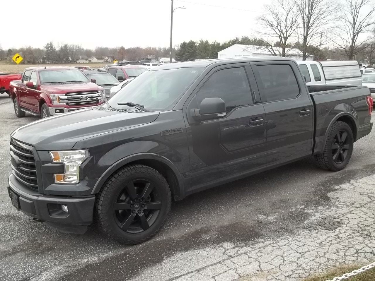 2016 Ford F-150 XLT in Lithium Gray — front three-quarter view