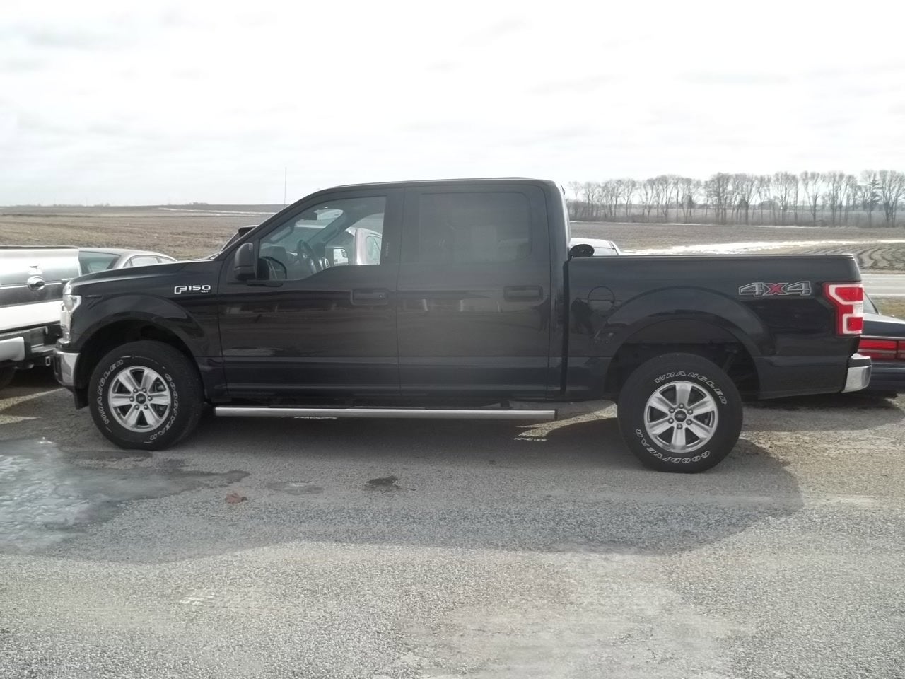 2018 Ford F-150 XLT in Shadow Black — front three-quarter view