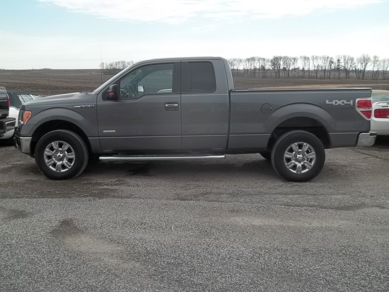 2012 Ford F-150 XLT in Sterling Gray Metallic — front three-quarter view