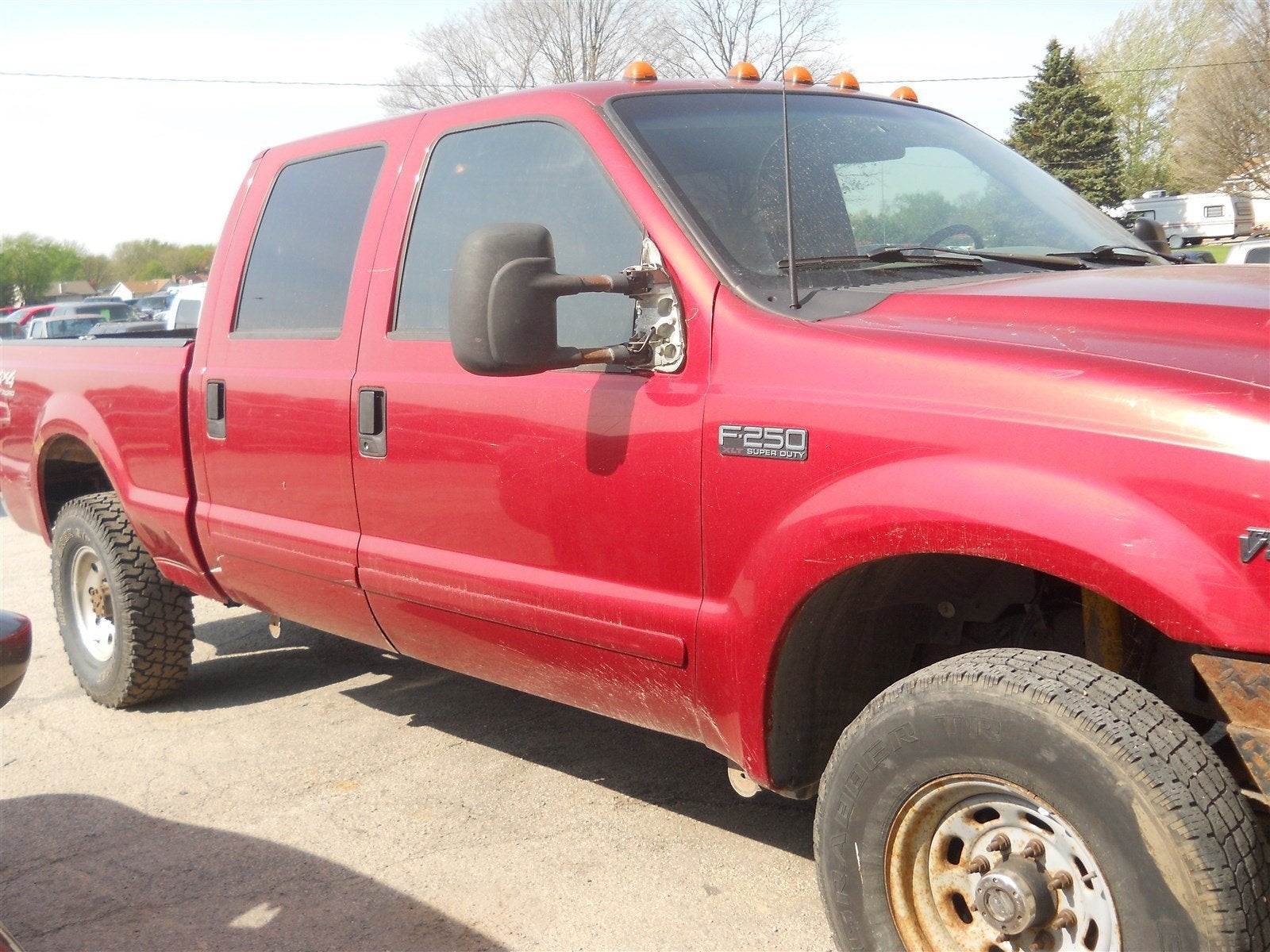 2001 Ford Super Duty F-250 XLT in Red — front three-quarter view