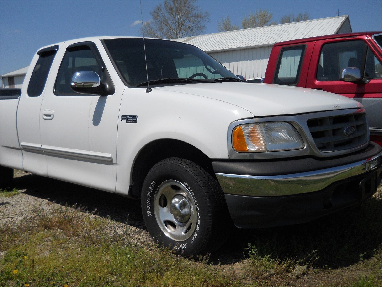 2003 Ford F-150 XLT in Oxford White — front three-quarter view