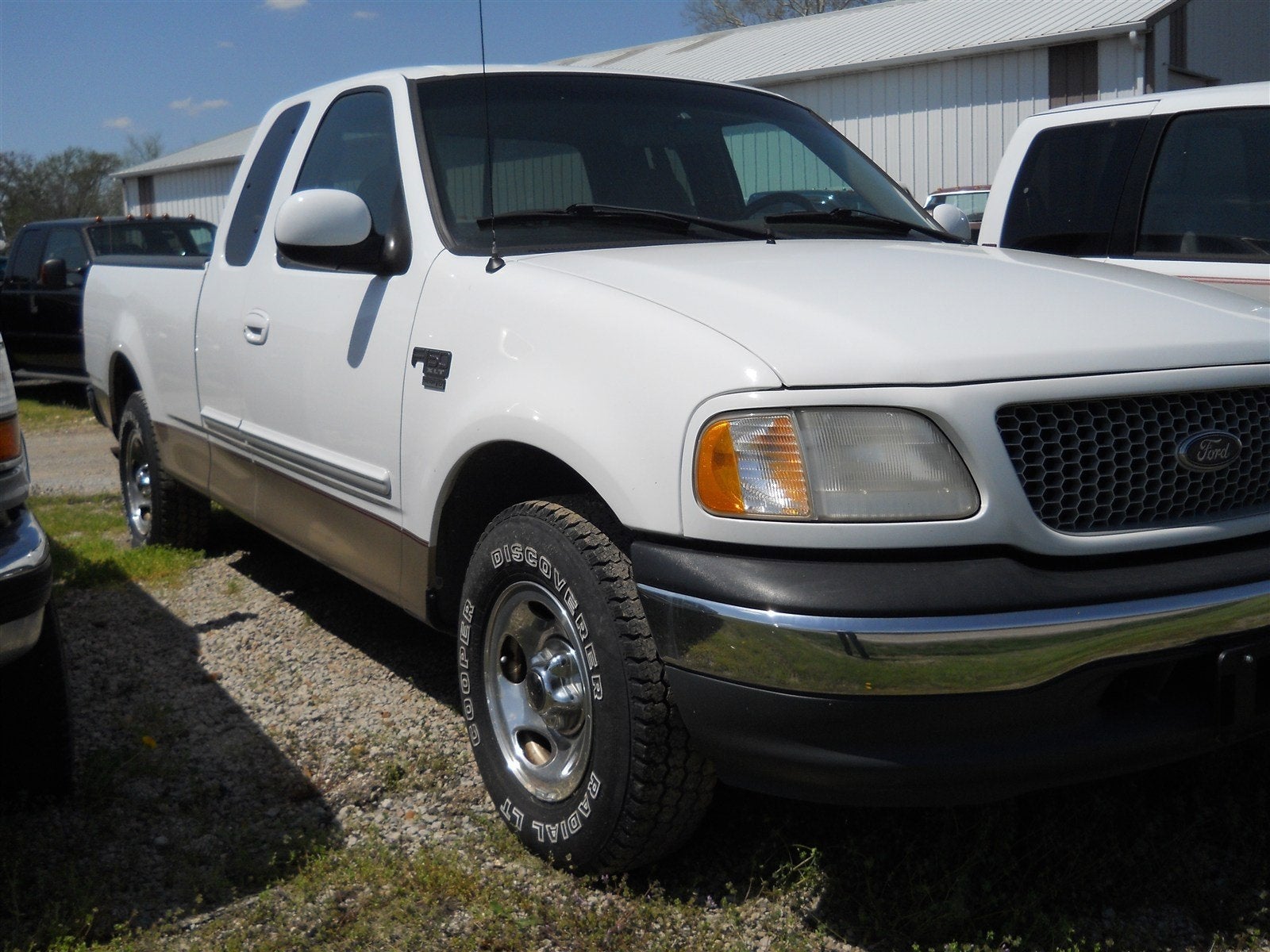 1999 Ford F-150 XLT in Oxford White — front three-quarter view