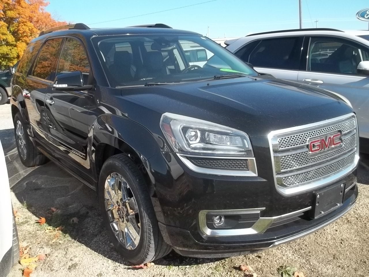 2016 GMC Acadia — rear three-quarter view