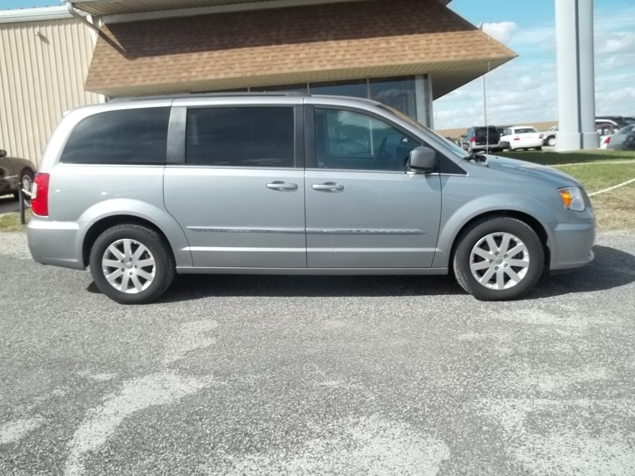 2016 Chrysler Town & Country Touring in Billet Silver Metallic Clearcoat — front three-quarter view