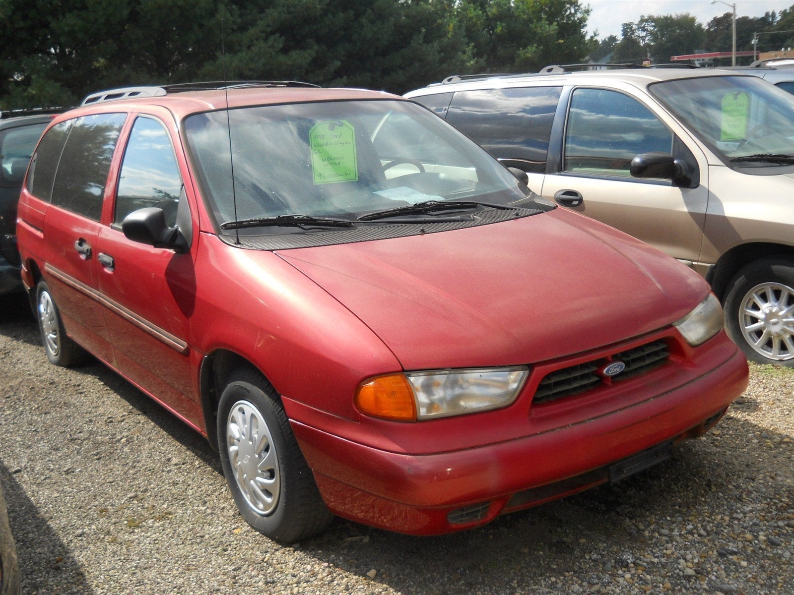 1998 Ford Windstar Wagon LX in Cabernet Red (Cc/Met) — front three-quarter view