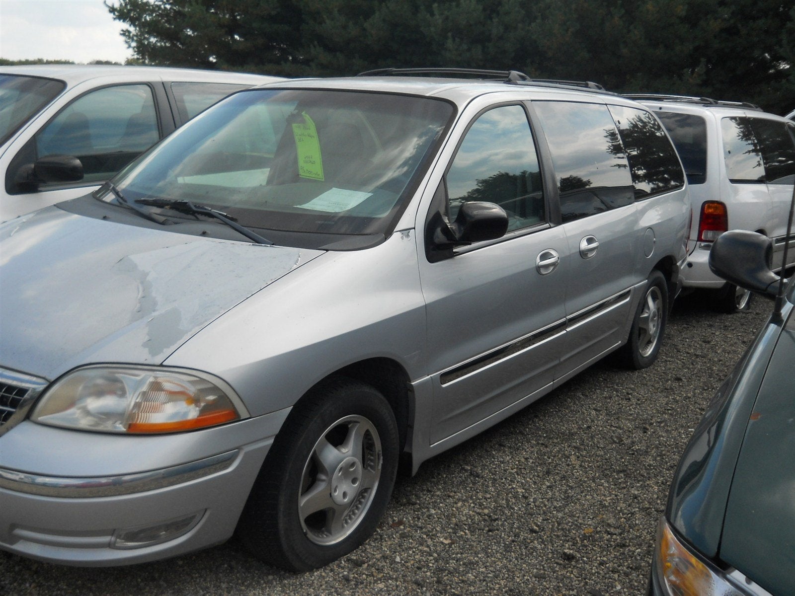 1999 Ford Windstar Wagon SEL in Silver Frost Metallic — front three-quarter view